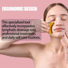 A woman with closed eyes uses a yellow and gold facial lymphatic drainage tool on her cheek, set against a solid pink background with promotional text overlays.