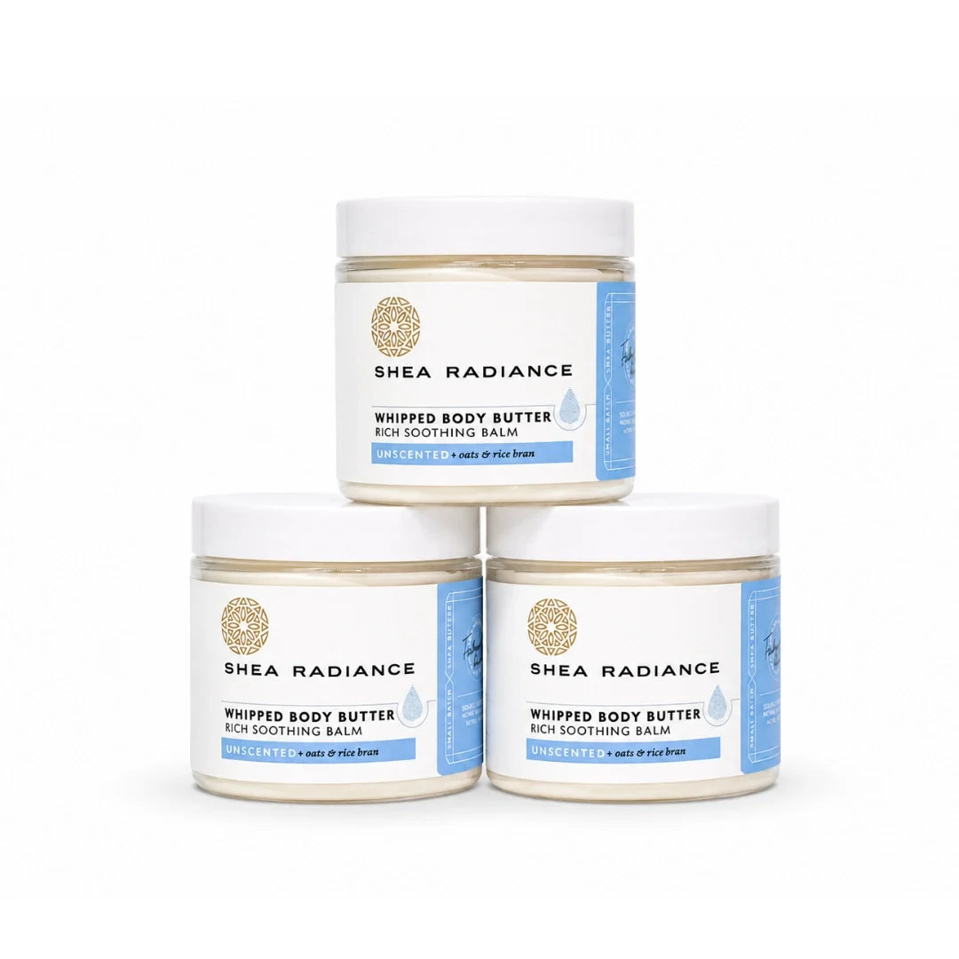 Three jars of Shea Radiance Whipped Body Butter Rich Soothing Balm stacked in a pyramid on a white background.