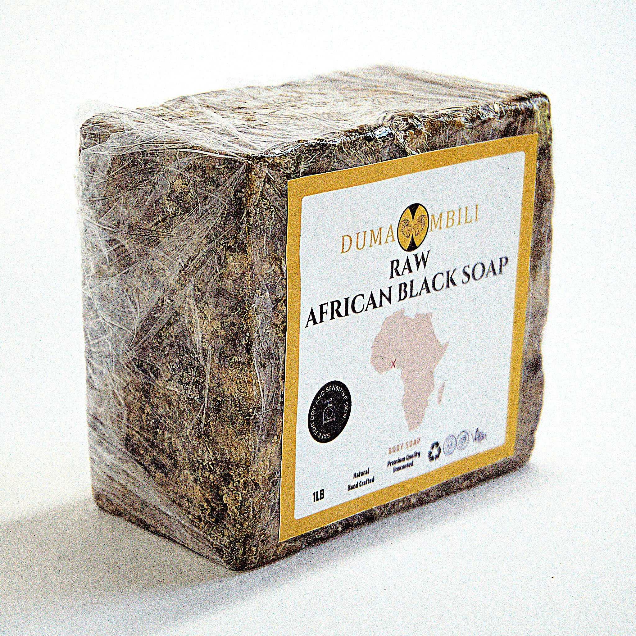 Raw African Black Soap bar with Dumaombili label on a white background