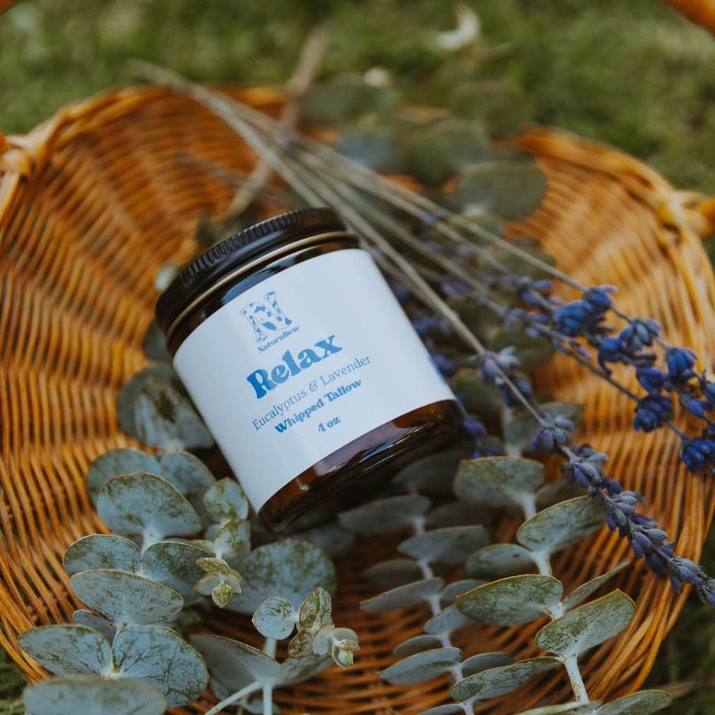 Small jar labeled 'Relax' with lavender and eucalyptus on a woven surface