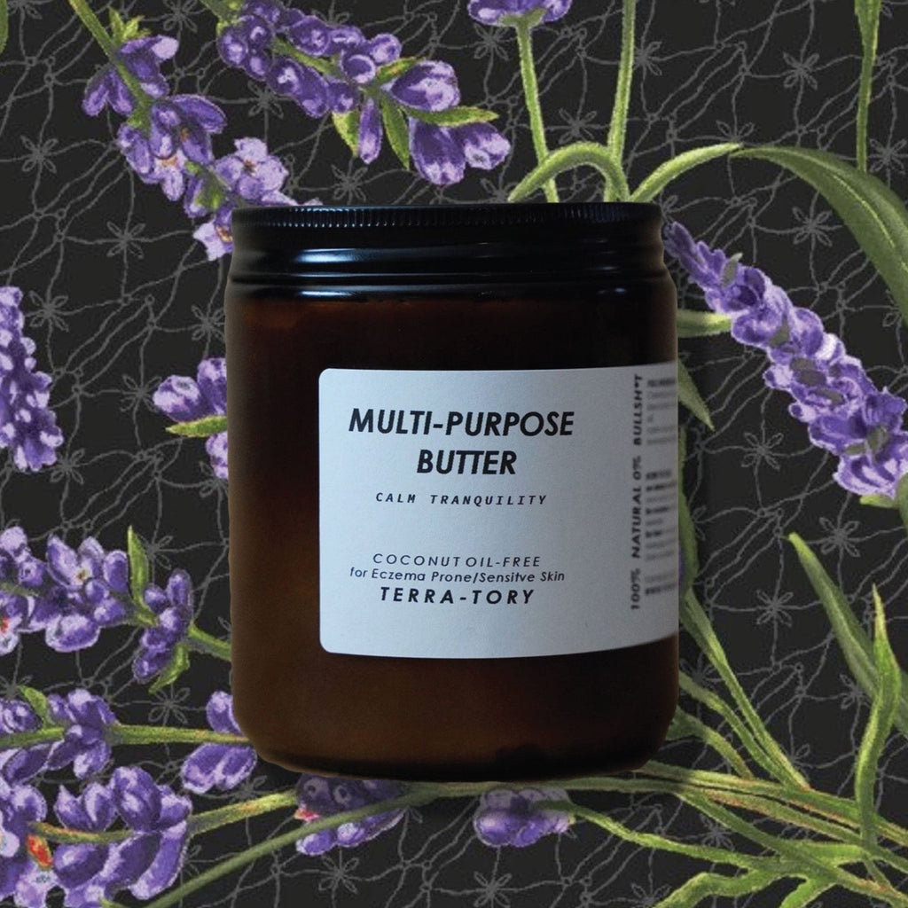 Jar of multi-purpose butter with lavender flowers in the background