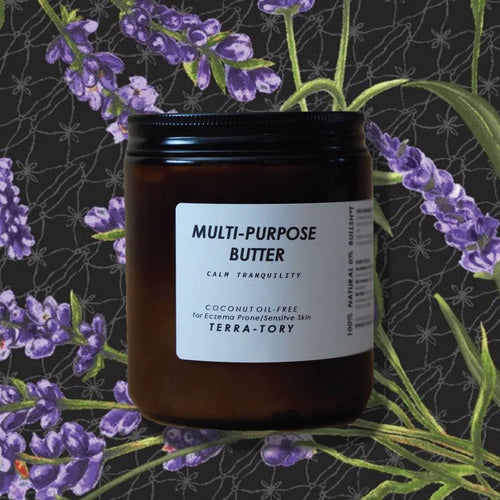 Jar of multi-purpose butter with lavender flowers in the background